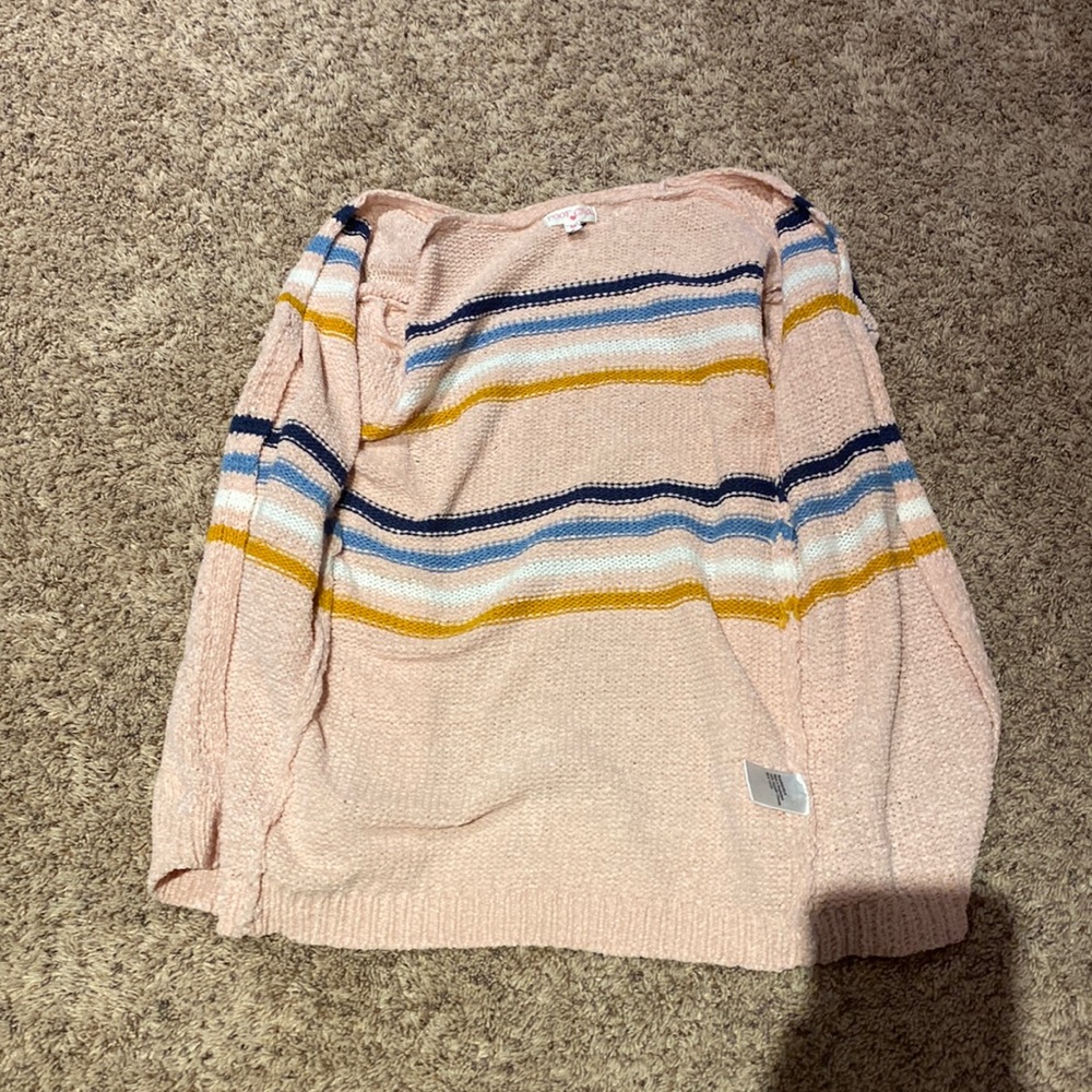 A very nice sweater. Colors: Pink, blues, white, and brown only worn once